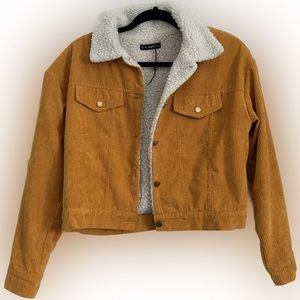 Gorgeous yellow jacket with super warm and cozy inner lining.